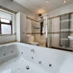 master bedroom en suite bathroom photo two.jpg